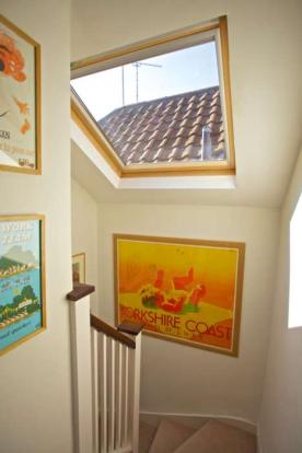 Tom Purvis travel poster on our old walls