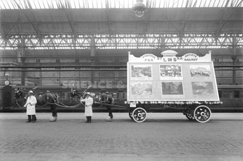 Poster wagon railway poster display for Blackpool carnival