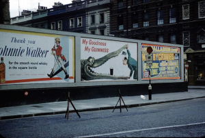 Gilroy Guinness poster crocodile on hoarding 1957
