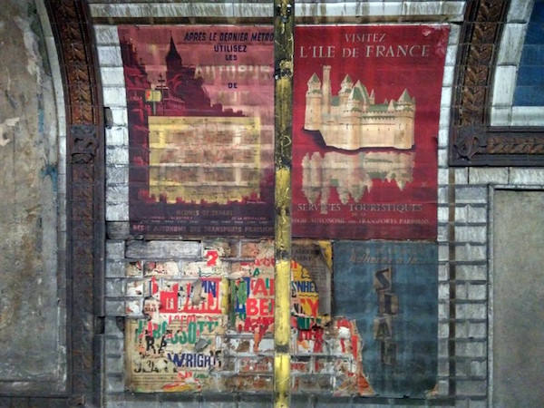 Old posters revealed on Paris Metro at Trinité station